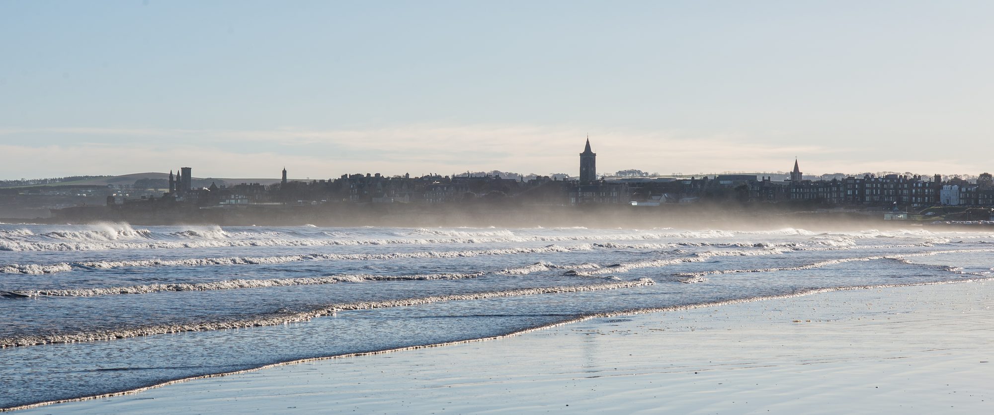 The St Andrews skyline seen across the water from the beach